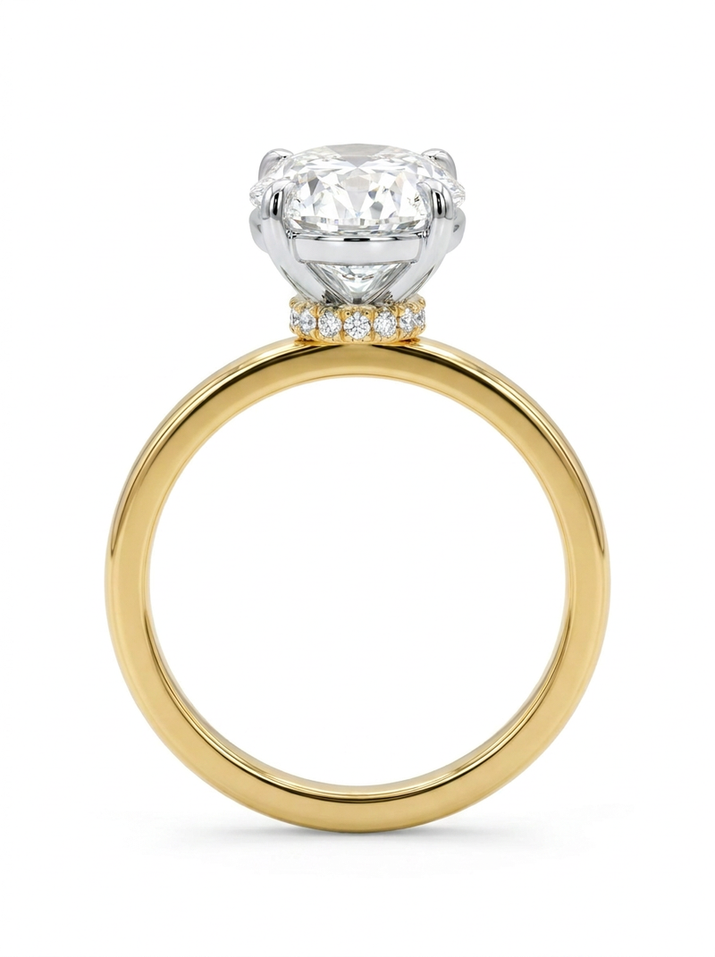 The Plinth | Oval Solitaire & Knife-Edge Band — worn view