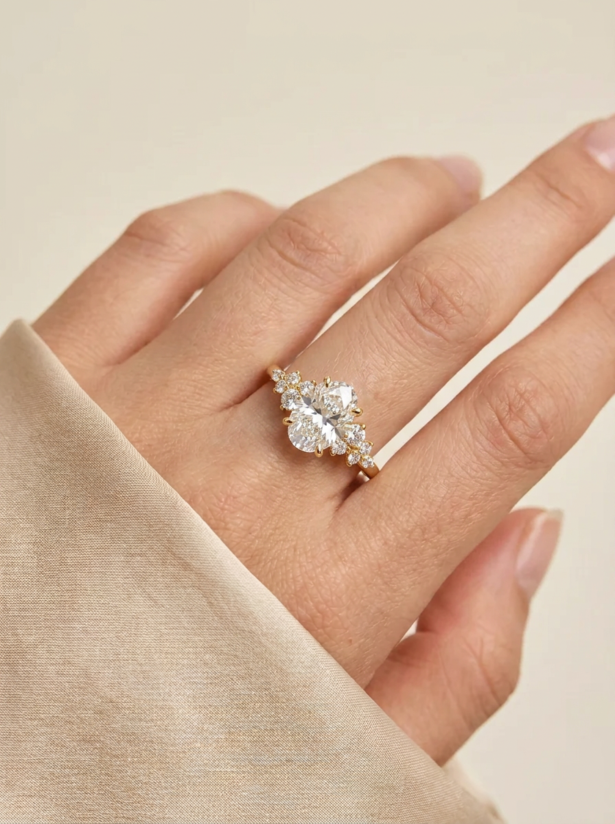 The Oval Cluster | Oval Diamond Engagement Ring with Cluster Side Stones
