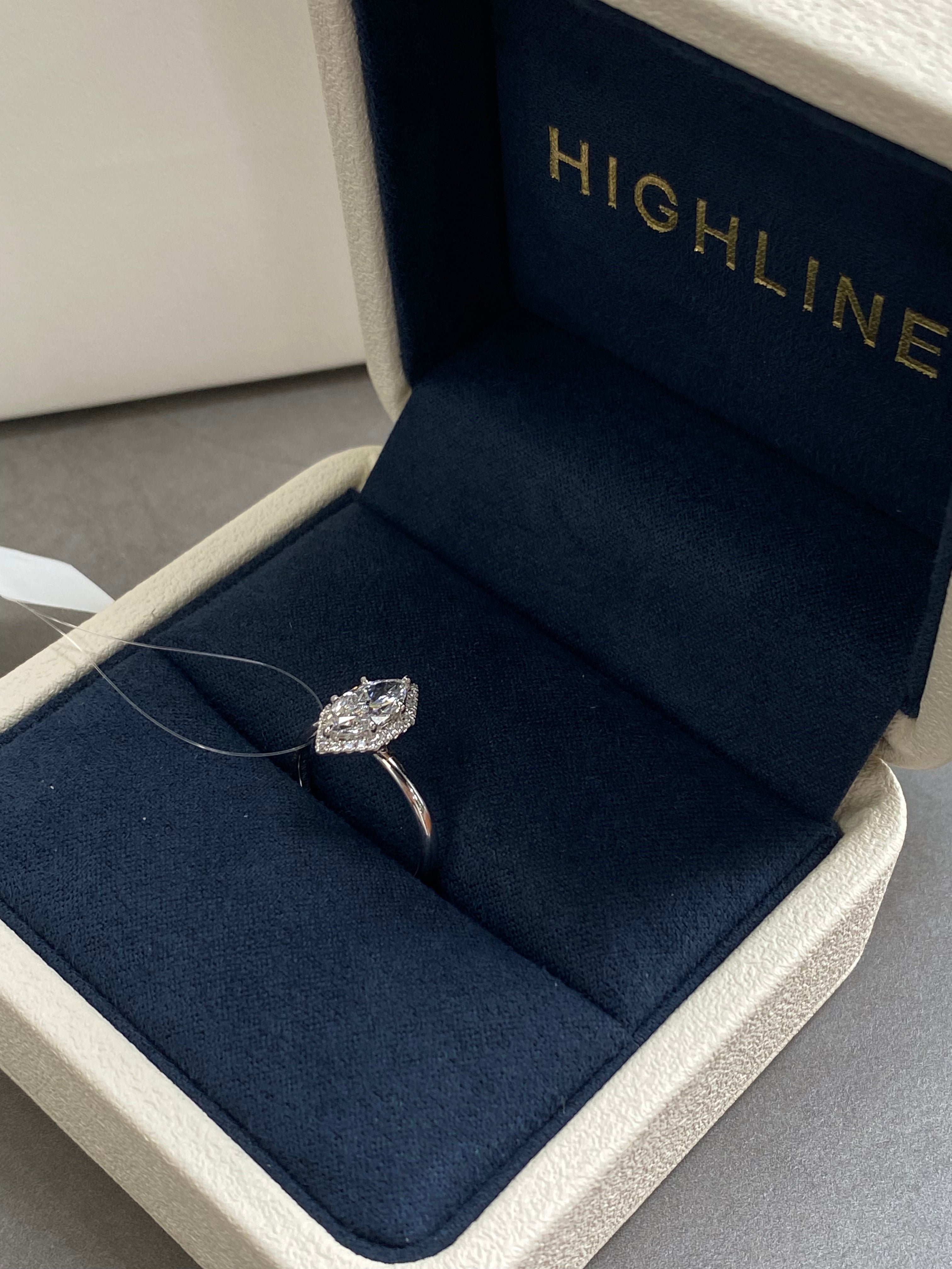 The Marquise Halo classic smooth band diamond ring, detail view ready to ship — Highline Diamond