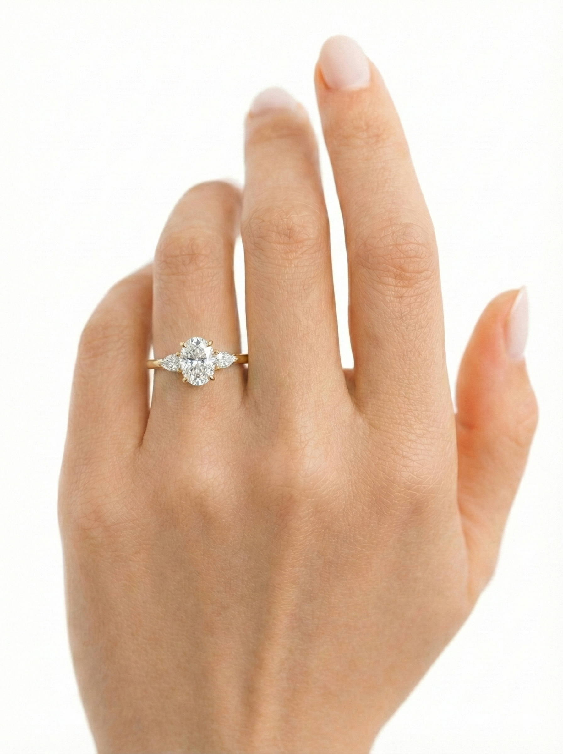 The Grace | Oval & Pear Three-Stone Ring