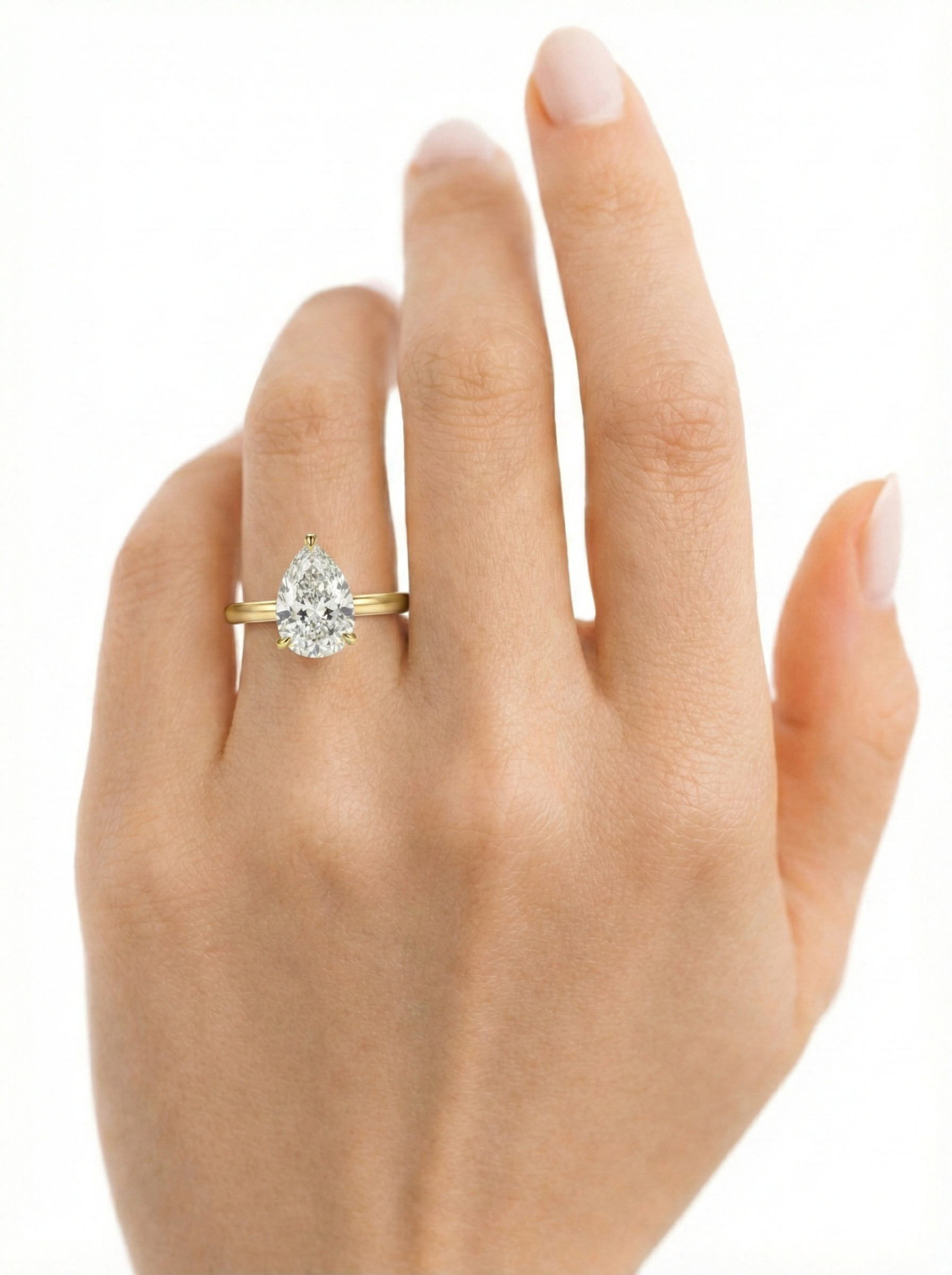 The Dew | Pear Cut Solitaire Ring