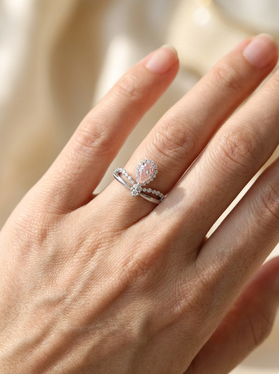 The Aria | Suspended Pink Pear & Diamond Arch Ring